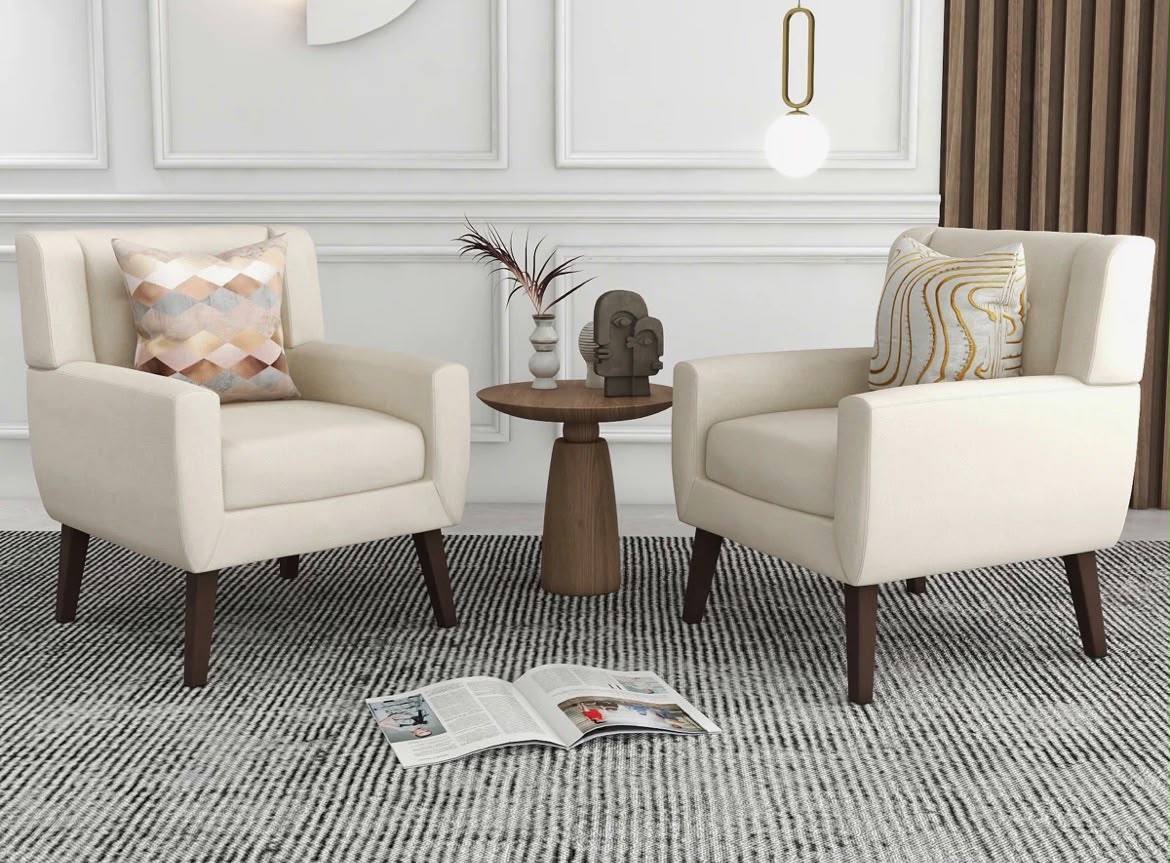 Two armchairs facing each other in a quiet meeting room